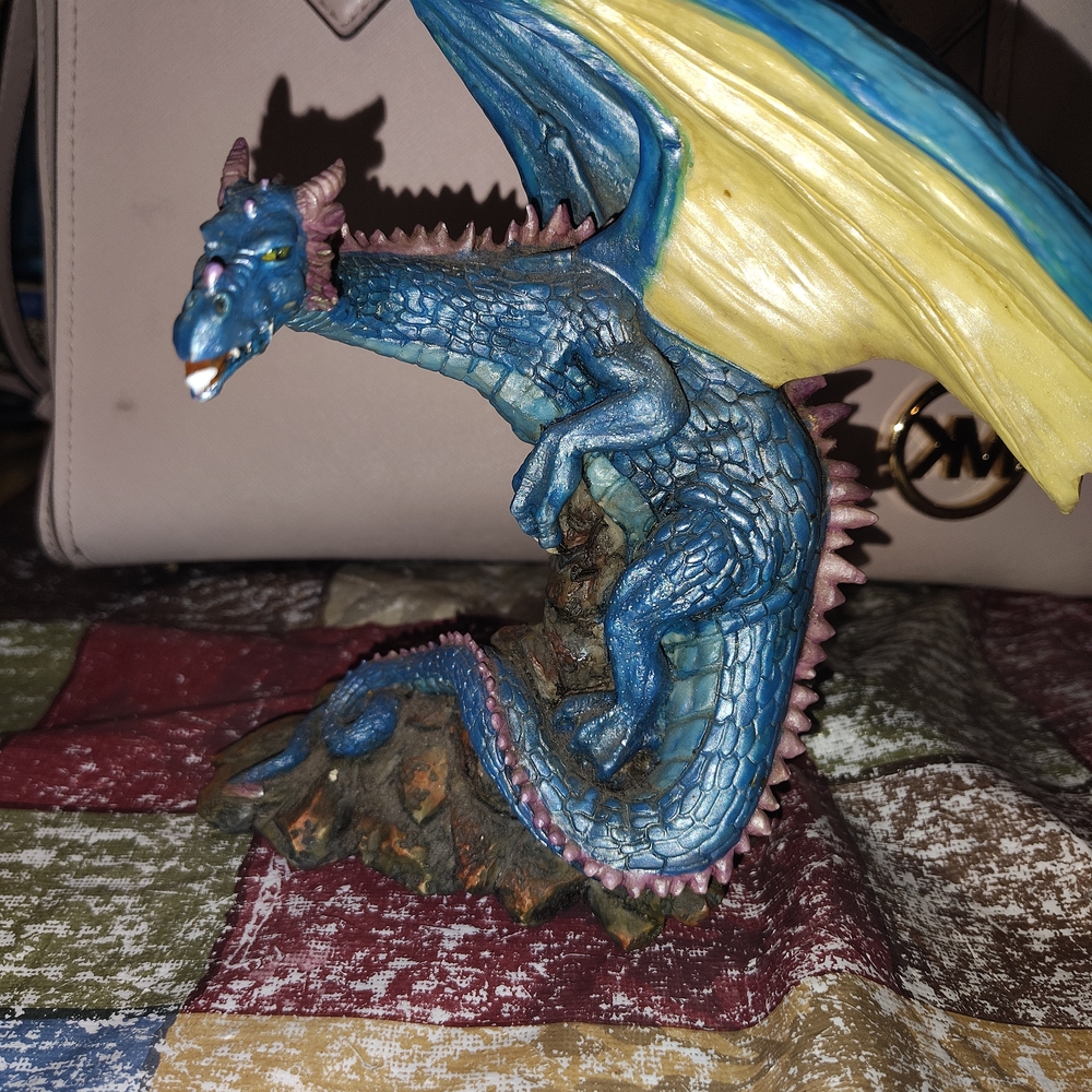 Vintage 1998 Summit Collection winged blue dragon figurine.